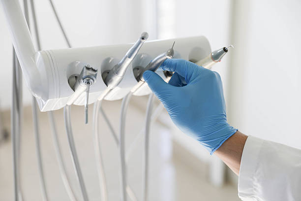 Professional Tooth Extraction technician working in Rockwood, MI